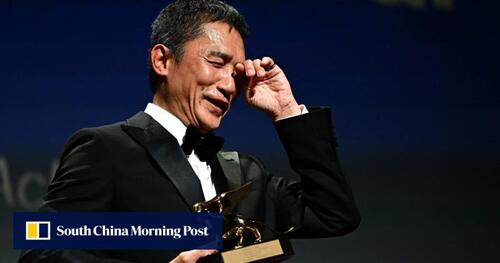 Congrats Tony Leung Chiu-wai, who has just brought home the prestigious Golden Lion at the 80th Venice International Film Festival! Being the first Chinese actor to receive the much-coveted lifetime achievement award in movies, Leung paid an emotional tribute to his home city in his acceptance speech, thanking "Hong Kong cinema" and the "‘wonderful people" he has worked with.    From humble beginnings in a local TV drama (1) and making his debut on the silver screen in 1983 (2), playing a wide array of award-winning roles such as a deaf and mute son (3), a struggling undercover cop (4), a lovestruck journalist (5), etc., the iconic actor has been a screen magnet without fail in whatever genre of films that he took on in his 40-year-long career.    (1) Soldier of Fortune (1982) (2) Mad, Mad 83 (1983) (3) City of Sadness (1989) (4) Infernal Affairs (2002) (5) In the Mood for Love (2000)   https://lnkd.in/gA_qfaTH   #hongkong #brandhongkong #asiasworldcity #cosmopolitanhk #TonyLeung #VeniceInternationalFilmFestival